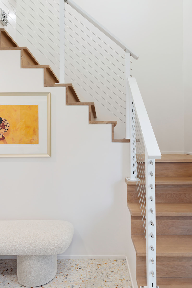 Cable stair railing and white oak stairs