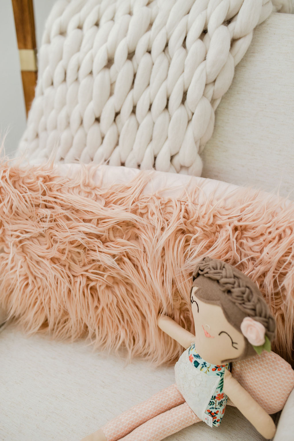 Faux fur pink lumbar pillow and doll, YouthfulNest Nursery Design