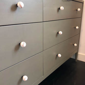 Bloys bedroom dresser with baseball knobs