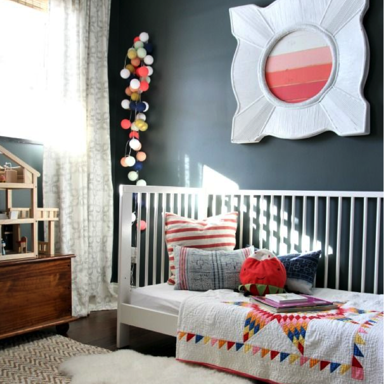 Toddler room with mature colors dark grey wall paint
